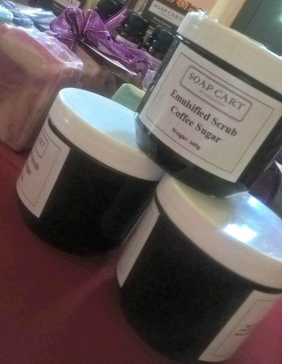 Jars of emulsified coffee sugar scrub.