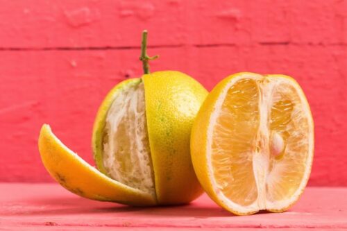 Bergamot oranges color yellow on old wood